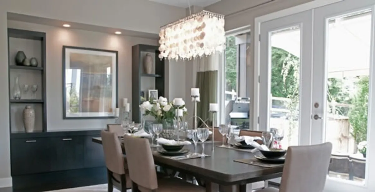 Elegant dining room chandelier installation above table in Santa Rosa, CA